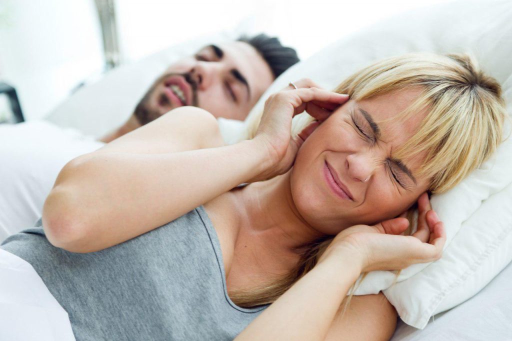 Man snoring loudly during sleep