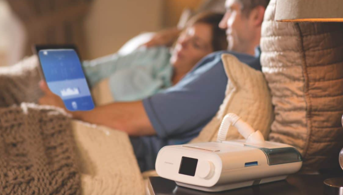Philips DreamStation CPAP machine on bedside table | CPAP.co.uk